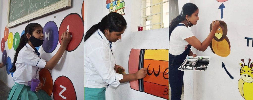 Students painting classroom walls