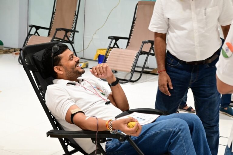Volunteer donating blood at Happy Faces Vadodara camp